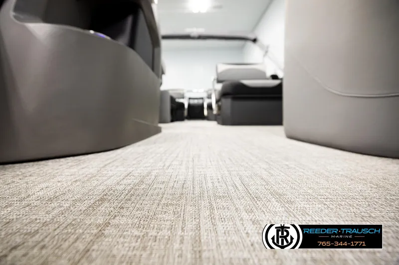 Slide: The Image of Interior view of 2026 Avalon LSZ QLS boat with modern seating and carpet flooring. - 53