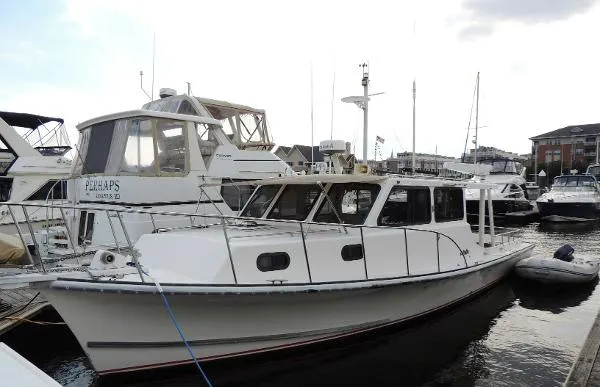 Slide: The Image of ROBBINS 40 Robbins Deadrise Customized for cruising 1996 - 1