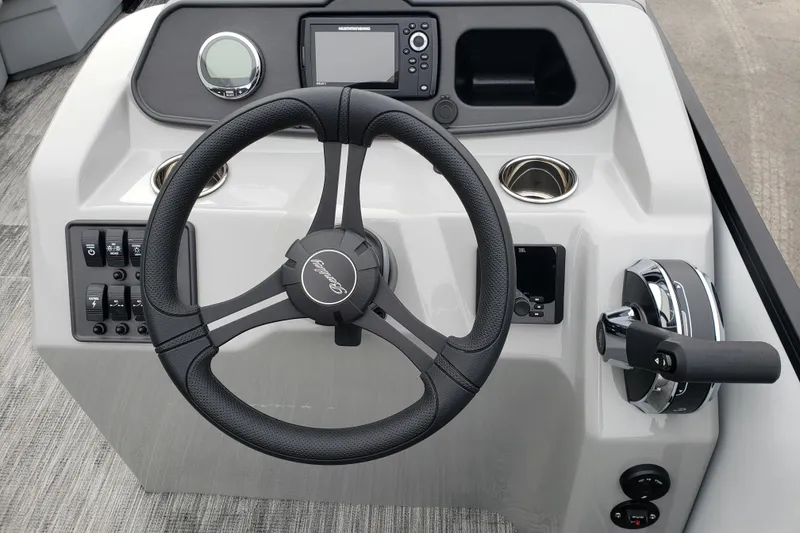 Slide: The Image of 2026 Bentley Pontoons Bolt 223 steering console with modern controls and sleek design. - 9