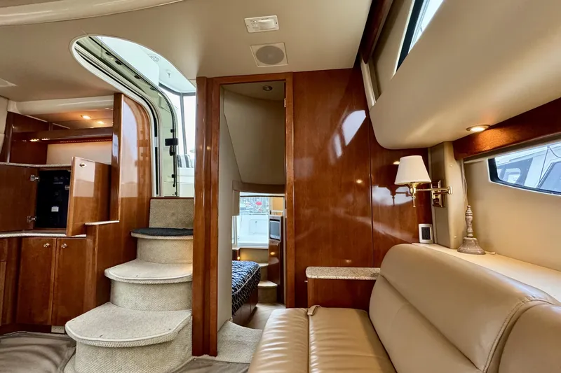 Slide: The Image of Luxurious interior of 2007 Meridian 459 Motoryacht with elegant wood finishes and plush seating. - 22