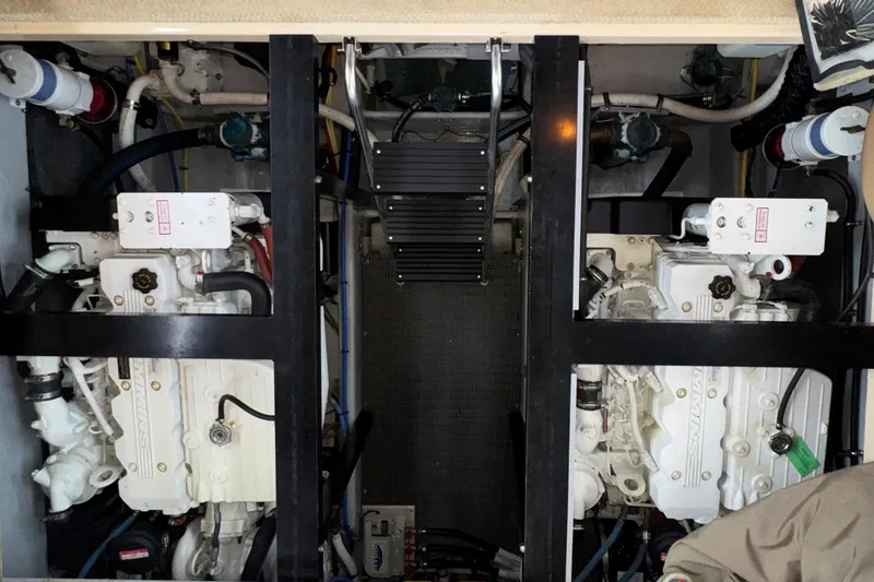 Slide: The Image of Engine room of 2007 Meridian 459 Motoryacht with twin engines and mechanical components. - 46