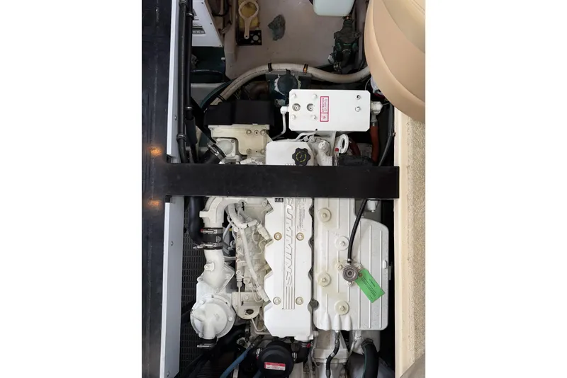 Slide: The Image of Engine compartment of a 2007 Meridian 459 Motoryacht, featuring a Cummins engine. - 47