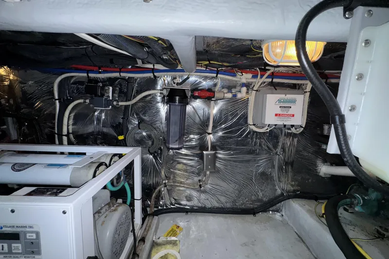 Slide: The Image of Engine room of 2007 Meridian 459 Motoryacht with wiring and equipment. - 52
