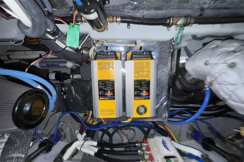 Slide: The Image of Engine room of 2007 Meridian 459 Motoryacht with electrical components and wiring. - 56