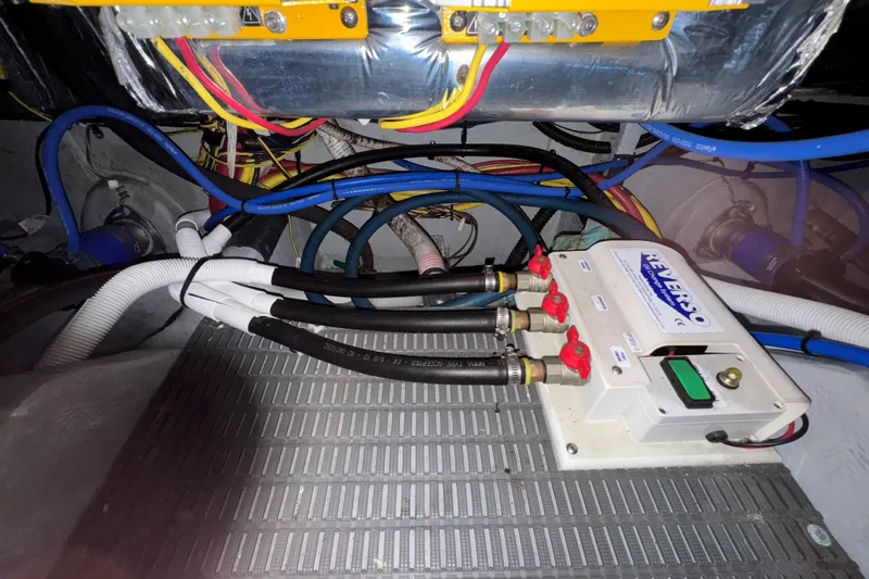 Slide: The Image of Engine room of 2007 Meridian 459 Motoryacht with wiring and Reverso pump system. - 58