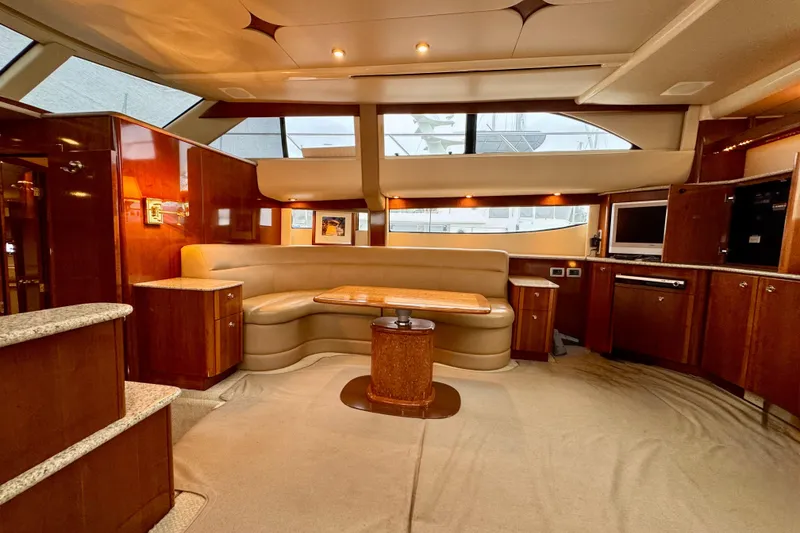 Slide: The Image of Luxurious interior of 2007 Meridian 459 Motoryacht with elegant wood finishes and plush seating. - 6