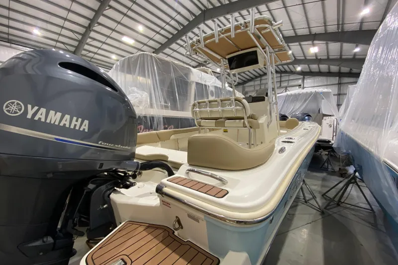 Slide: The Image of 2019 Pioneer 202 Islander boat with Yamaha engine in storage facility. - 3
