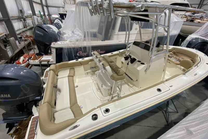 Slide: The Image of 2019 Pioneer 202 Islander boat with Yamaha engines in storage facility. - 7
