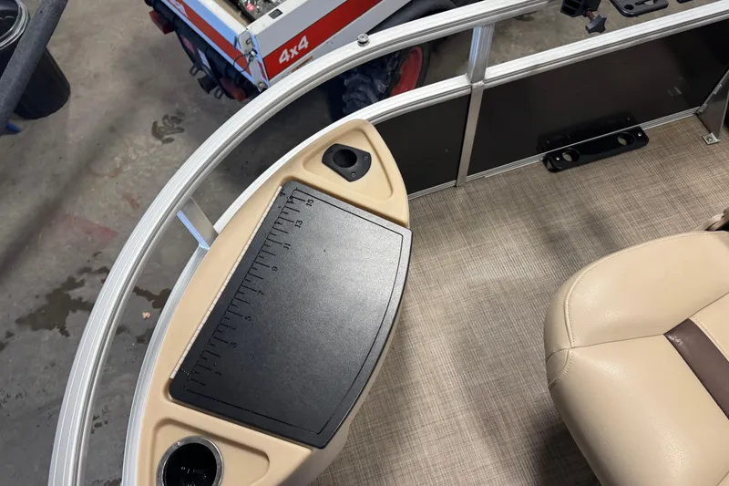 Slide: The Image of 2019 Sun Tracker Fishin' Barge 22 XP3 interior with measuring board and seating. - 6