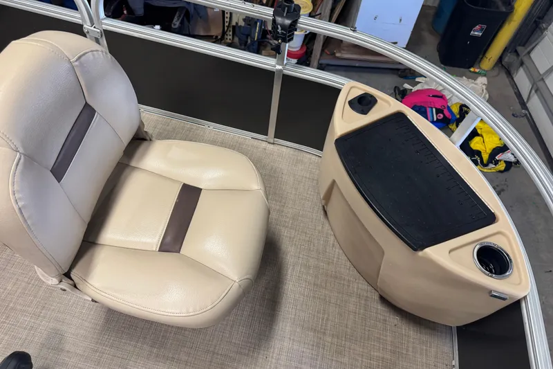 Slide: The Image of 2019 Sun Tracker Fishin' Barge 22 XP3 interior with beige seat and console. - 8
