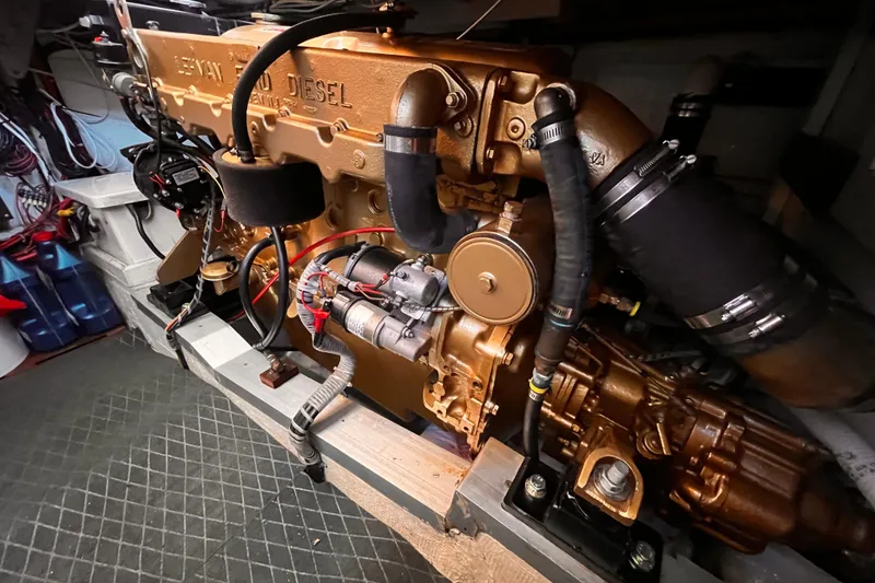 Slide: The Image of Engine room of a 1979 Grand Banks 36 Classic with a Ford Lehman diesel engine. - 12
