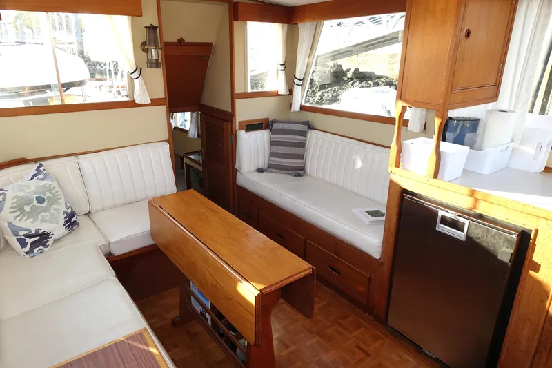 Slide: The Image of Interior of 1979 Grand Banks 36 Classic yacht with cozy seating and wooden accents. - 34