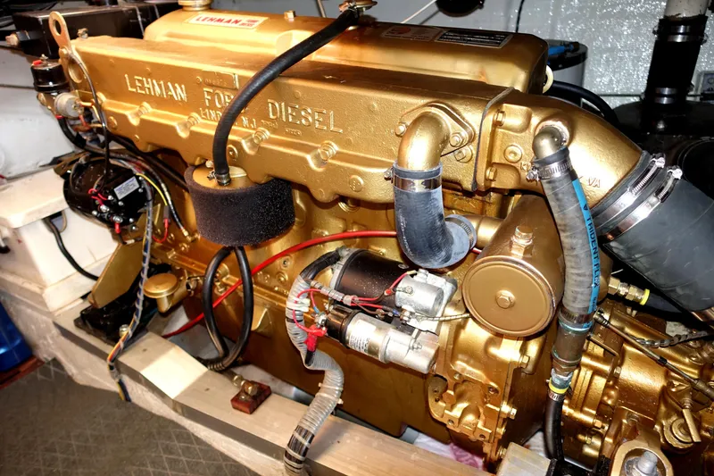 Slide: The Image of 1979 Grand Banks 36 Classic Lehman Ford diesel engine in a boat's engine room. - 48