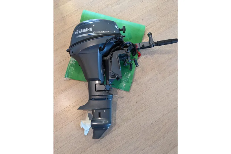 Slide: The Image of Yamaha outboard motor on wooden floor, suitable for 1979 Grand Banks 36 Classic. - 53