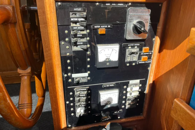 Slide: The Image of Electrical control panel on a 1979 Grand Banks 36 Classic boat. - 57