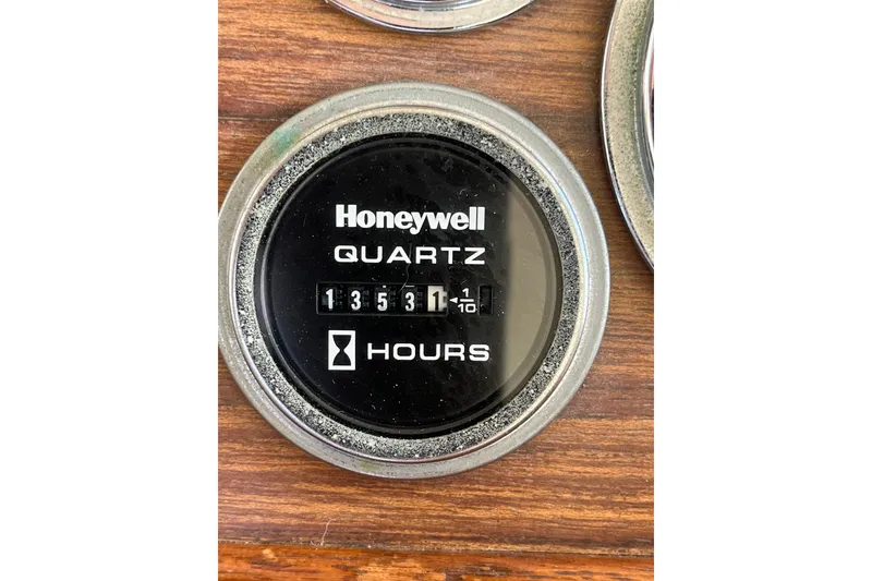 Slide: The Image of Hour meter reading 1353.1 hours on 1979 Grand Banks 36 Classic boat. - 63