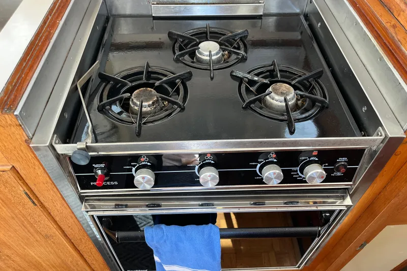 Slide: The Image of Stove and oven in 1979 Grand Banks 36 Classic boat kitchen. - 66