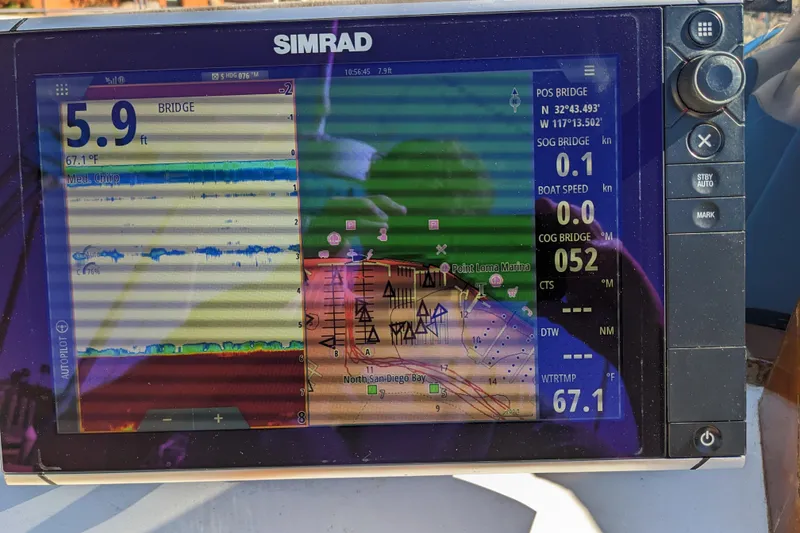 Slide: The Image of Simrad marine GPS display on a 1979 Grand Banks 36 Classic, showing navigation and depth data. - 72