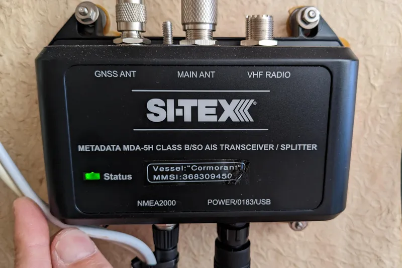 Slide: The Image of SI-TEX AIS transceiver on 1979 Grand Banks 36 Classic, displaying vessel status and connections. - 74