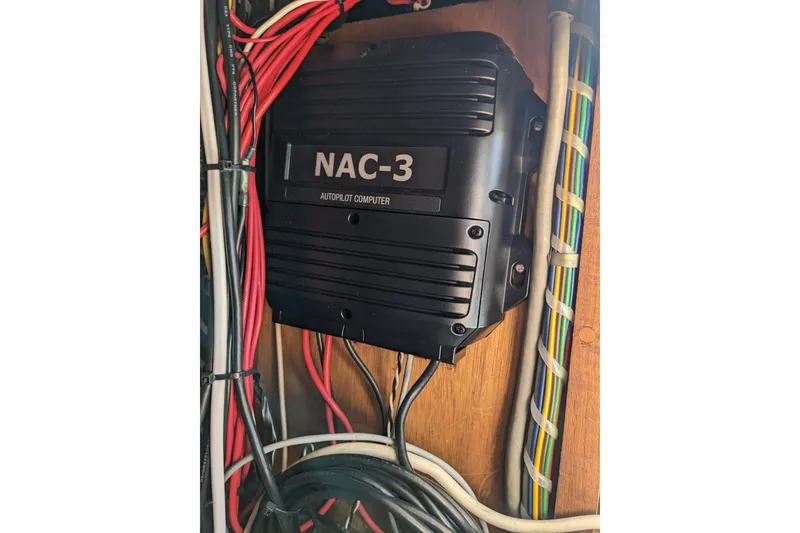 Slide: The Image of NAC-3 autopilot computer with wiring on 1979 Grand Banks 36 Classic boat. - 75