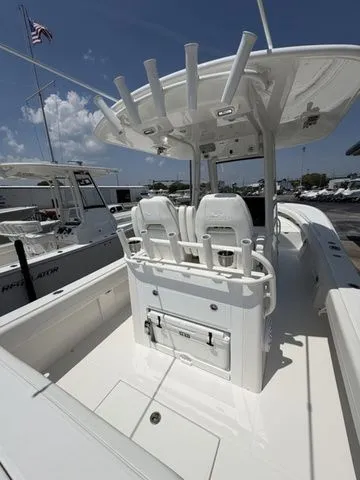 Slide: The Image of Regulator 28 boat 2026, modern design, spacious deck, fishing rod holders. - 2