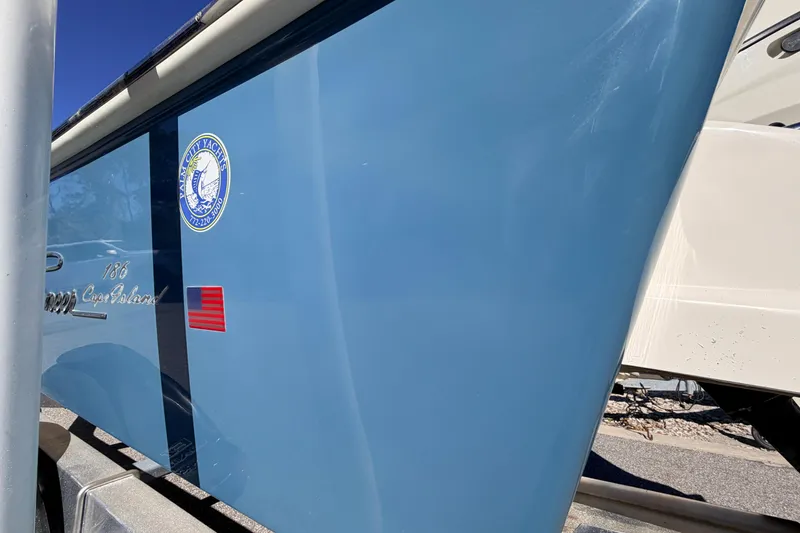 Slide: The Image of 2015 Pioneer 186 Cape Island boat with blue hull and yacht club sticker. - 12