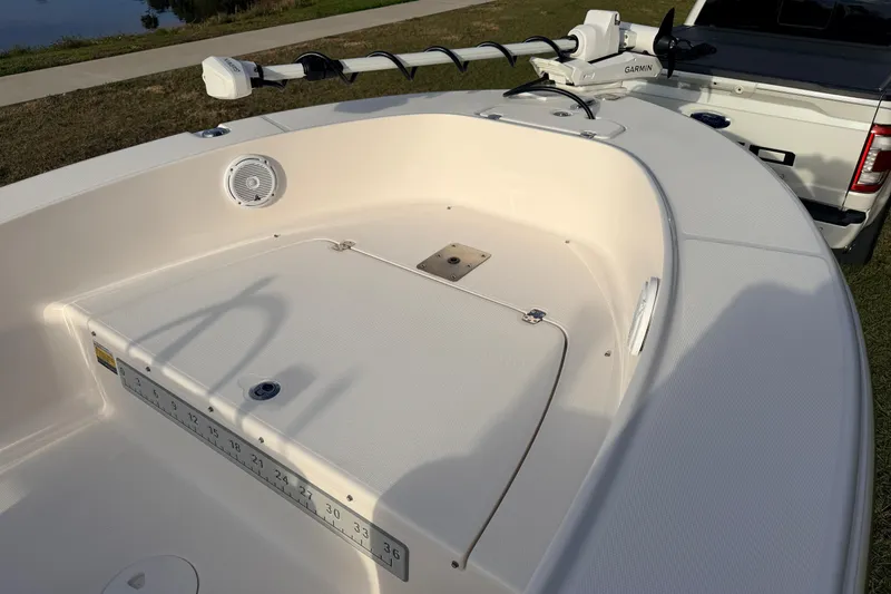 Slide: The Image of 2015 Pioneer 186 Cape Island boat deck with Garmin equipment and measurement scale. - 19
