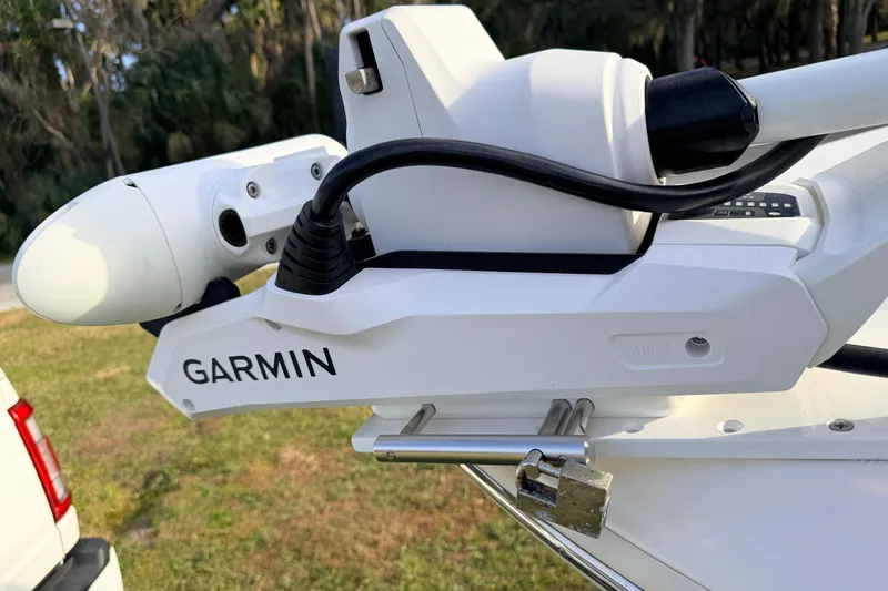 Slide: The Image of Garmin device mounted on 2015 Pioneer 186 Cape Island boat, outdoor setting. - 21