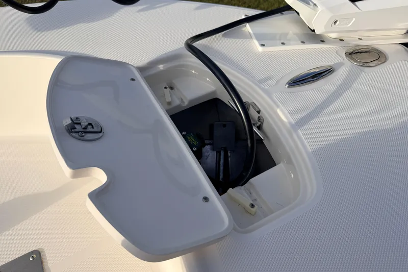 Slide: The Image of Open storage compartment on 2015 Pioneer 186 Cape Island boat deck. - 23