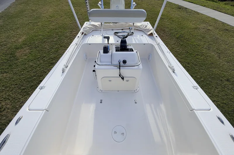 Slide: The Image of 2015 Pioneer 186 Cape Island boat interior with steering console, viewed from above. - 30