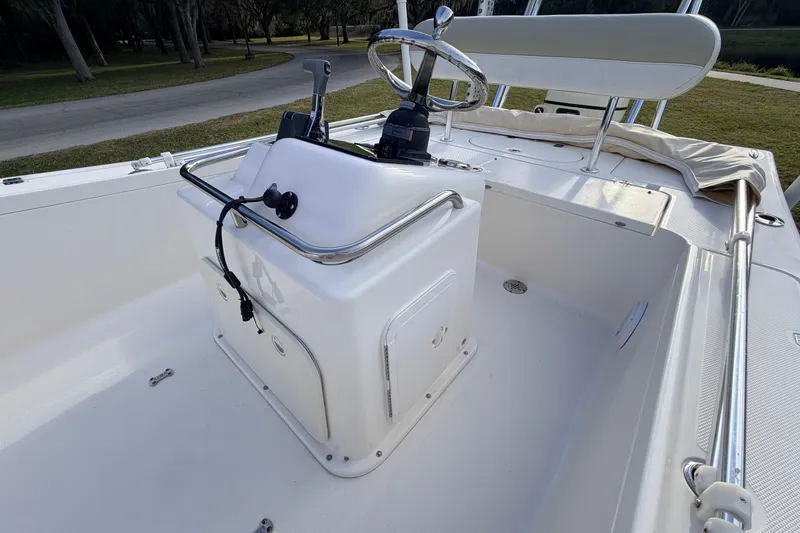 Slide: The Image of 2015 Pioneer 186 Cape Island boat interior with steering console and seating. - 32