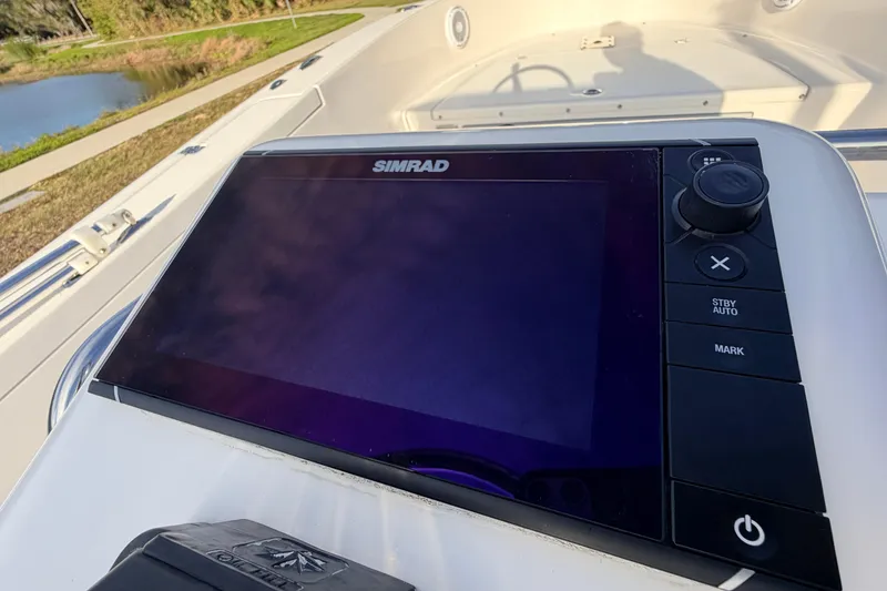 Slide: The Image of Simrad navigation system on 2015 Pioneer 186 Cape Island boat dashboard. - 39