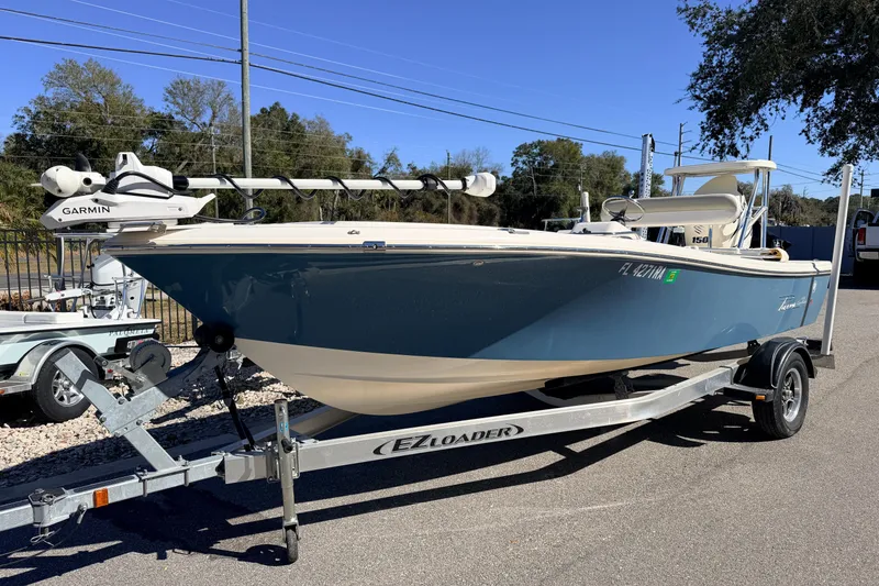 Slide: The Image of 2015 Pioneer 186 Cape Island boat on EZ Loader trailer, equipped with Garmin technology. - 4