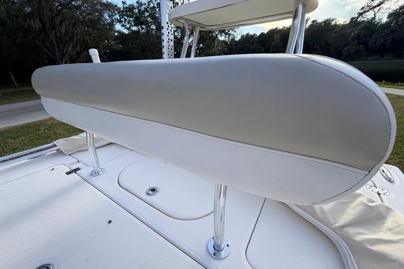Slide: The Image of 2015 Pioneer 186 Cape Island boat seat with white upholstery and chrome supports. - 44