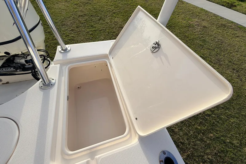 Slide: The Image of Open storage compartment on 2015 Pioneer 186 Cape Island boat, showing interior space. - 51