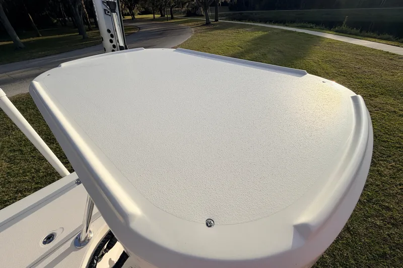 Slide: The Image of 2015 Pioneer 186 Cape Island boat deck, textured surface, outdoor setting. - 54