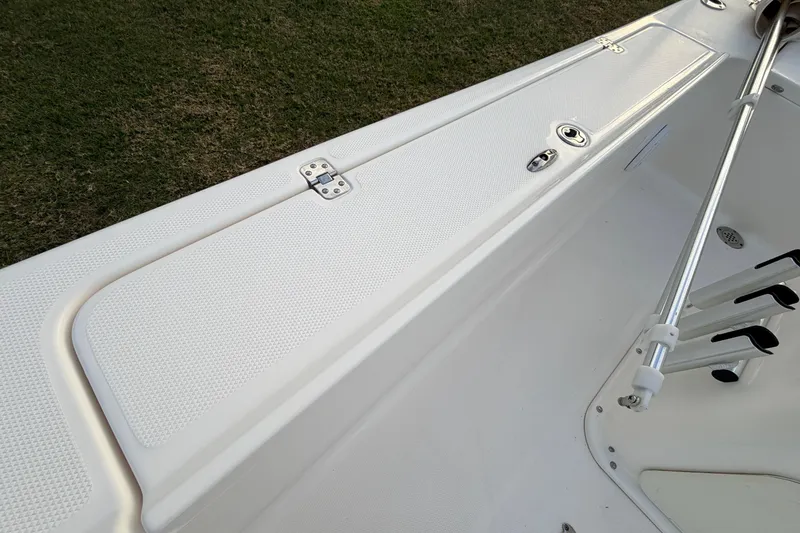 Slide: The Image of 2015 Pioneer 186 Cape Island boat interior with storage compartment and rod holders. - 60