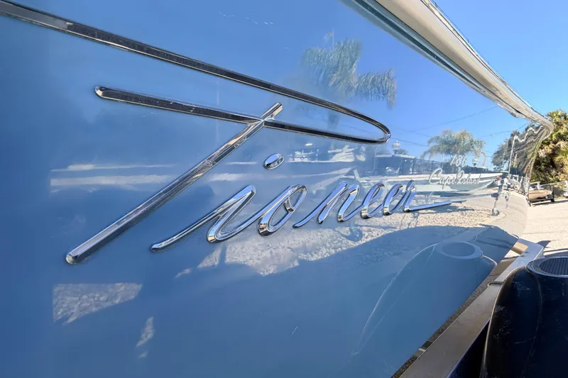 Slide: The Image of 2015 Pioneer 186 Cape Island boat with reflective blue finish and chrome lettering. - 63