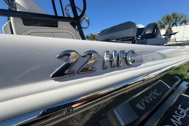 Slide: The Image of 2026 Sea Chaser 22 HFC boat, close-up of model emblem on side. - 6