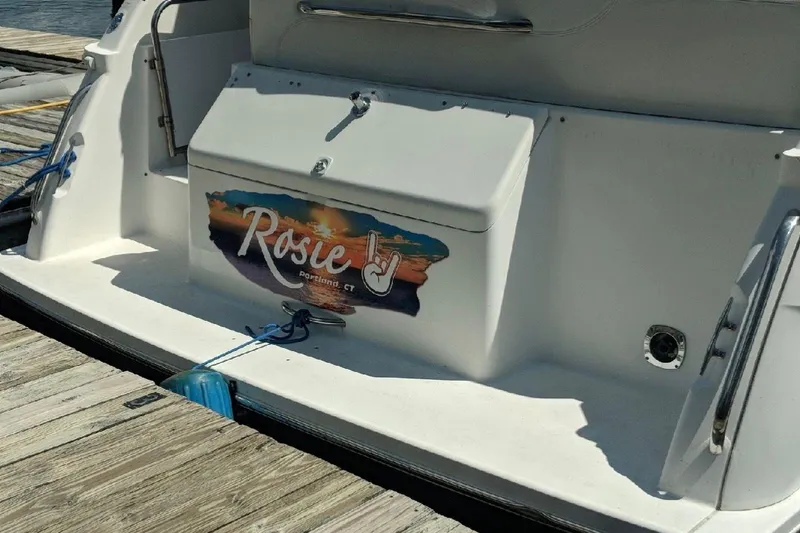 Slide: The Image of 1998 Wellcraft 3600 Martinique boat docked, featuring "Rosie" name and Portland, CT location. - 20