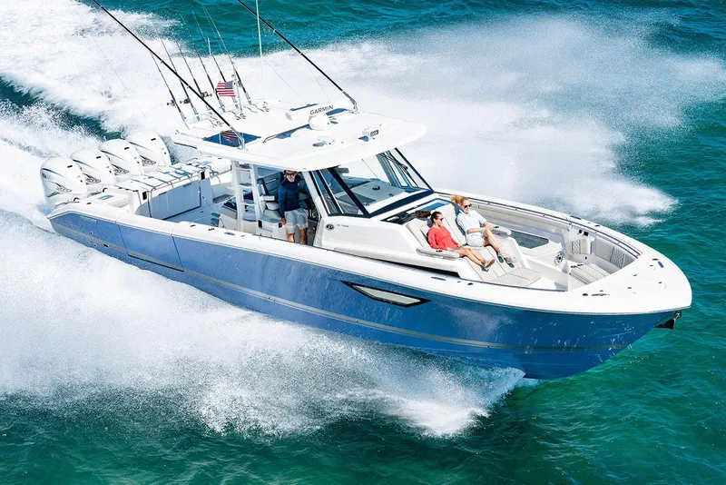 The Image of Manufacturer Provided Image: 2025 Pursuit S 428 Sport boat cruising on clear blue water. - 0