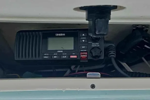 Slide: The Image of Uniden UM385 marine radio installed on 2019 Robalo R247 Dual Console boat. - 15