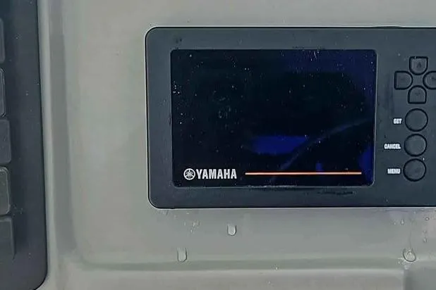 Slide: The Image of Yamaha display panel on 2019 Robalo R247 Dual Console boat dashboard. - 16