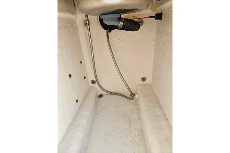 Slide: The Image of 2019 Robalo R247 Dual Console interior wiring and tubing detail. - 28
