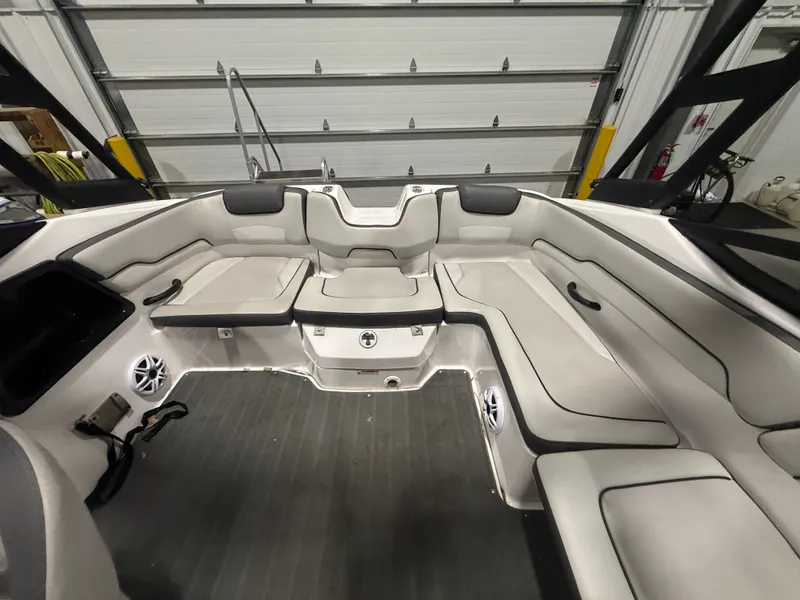 Slide: The Image of Interior view of a 2023 Yamaha AR190 with gray upholstery and speakers. - 6