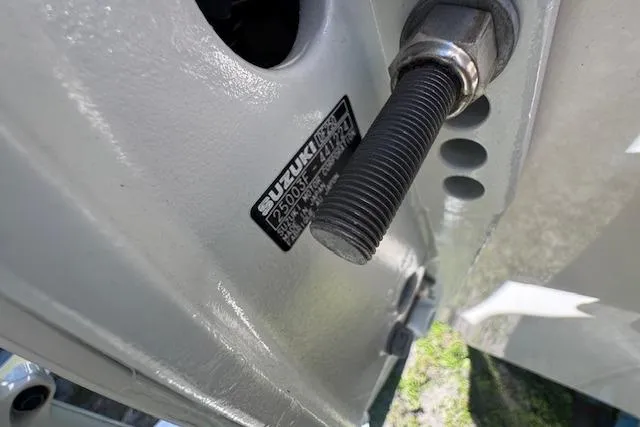 Slide: The Image of 2024 Carolina Skiff 26 Ultra Elite with Suzuki engine detail, close-up view. - 8