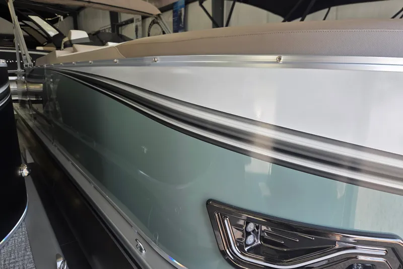 Slide: The Image of 2026 Avalon Platinum LSZ 2385 Cruise boat, sleek design with metallic accents. - 2