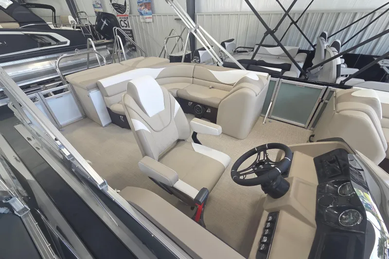 Slide: The Image of 2026 Avalon Platinum LSZ 2385 Cruise boat interior with luxurious seating and modern steering console. - 7