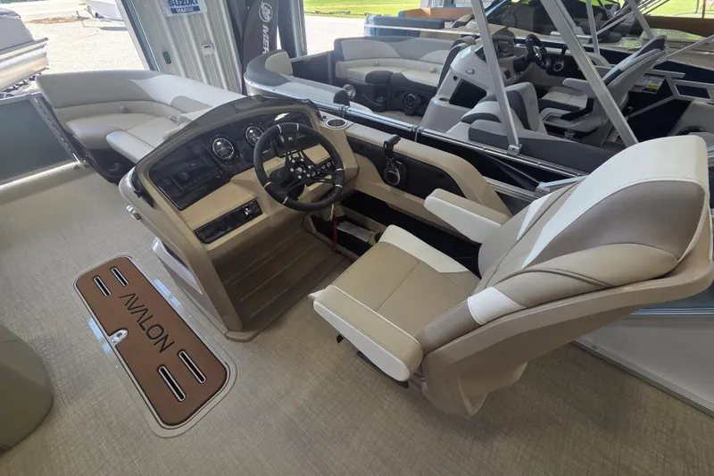 Slide: The Image of Interior of 2026 Avalon Platinum LSZ 2385 Cruise boat with luxurious seating and helm. - 8
