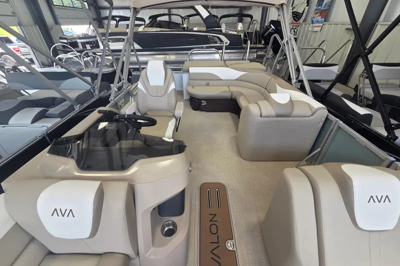 Slide: The Image of 2026 Avalon Platinum LSZ 2385 Cruise pontoon boat interior with luxurious seating and helm. - 9